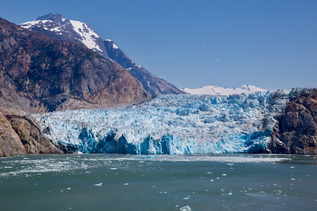 A tidewater glacier meeting the water near Tracy Arm Fjord, Alaska