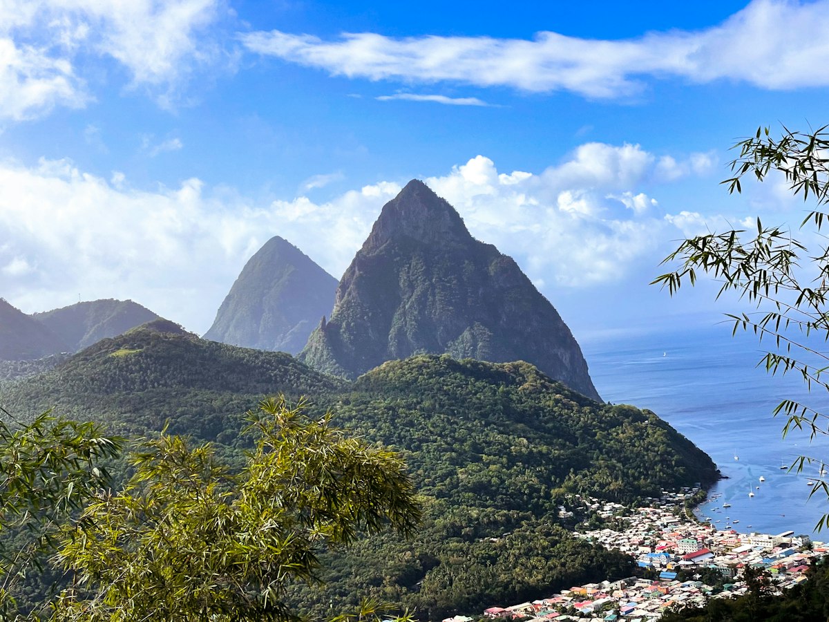The Pitons, twin volcanic peaks rising from the sea in St. Lucia
